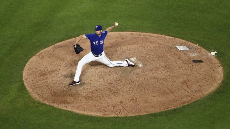Hamels limita a Yanquis y Rangers se imponen