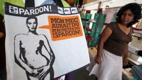 Primera dama francesa gana juicio por fotos desnudas