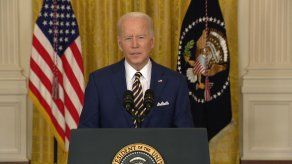 Biden dice que su primer año tuvo desafíos pero también enormes progresos