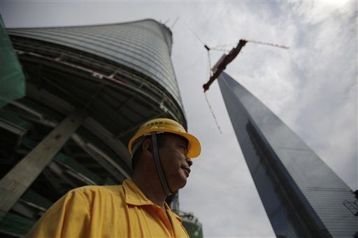 Instalan última viga en edificio más alto de China