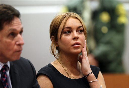 Lohan busca acuerdo extrajudicial