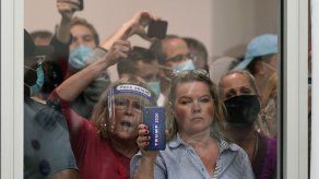 AP - MIKE HOUSEHOLDER y TIM SULLIVAN