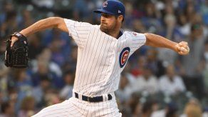 Hamels lanza juego completo y Cachorros vencen 7-1 a Rojos