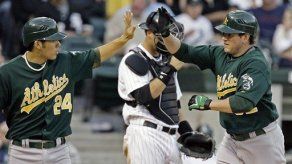 Triple de Reyes ayuda a Mets a vencer a Cardenales