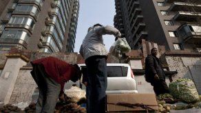 Inflación baja en China debido a menores precios de alimentos
