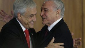 Piñera y Temer afinan relación económica y abrazan a la oposición venezolana