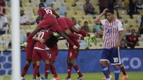 Qatar amarga a una discreta Paraguay con un empate 2-2