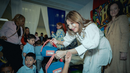 Peluches Remenditos llegan a niños de una escuela pública en Nueva York.