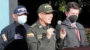 El director de la Policía Nacional de Colombia, general Jorge Luis Vargas (c) durante una conferencia de prensa en la sede de la Interpol en Bogotá.