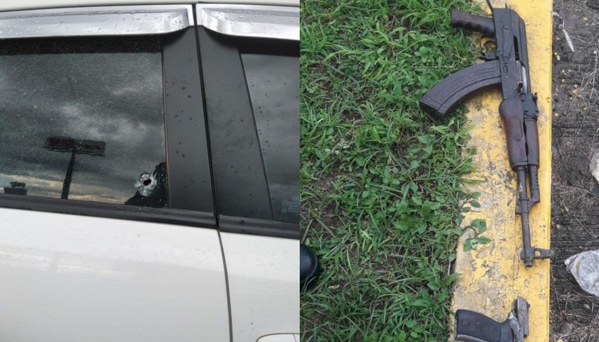 Vista de los vehículos impactados y las armas de fuego incautadas tras tiroteo en Penonomé.