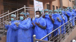 COLLEEN LONG, DAVID RISING y EMILY SCHMALL