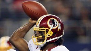 Griffin III fue más eficaz que Romo y complicó el futuro de Cowboys