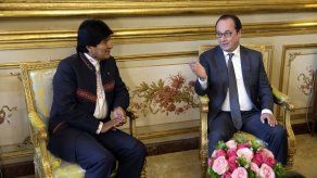 Hollande y Morales abogan por luchar a la vez contra la pobreza y cambio climático