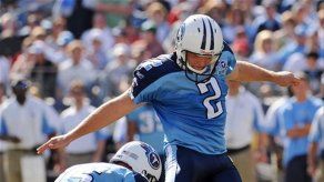 Titans rescatan en prórroga su condición de invictos