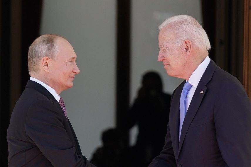 Vladimir Putin y Joe Biden.