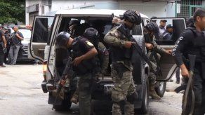 Policía ocupa barriada de Caracas tras choques con criminales